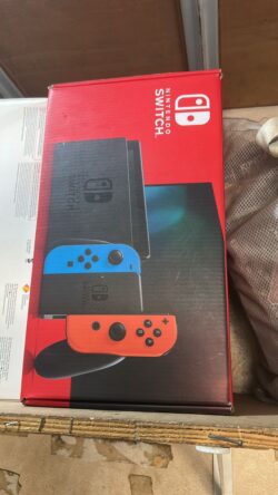 Nintendo Switch Console - Manettes Bleue et Orange - Neuve en boîte